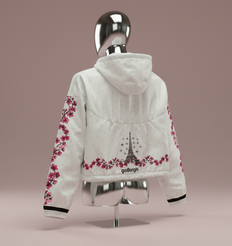 Full back product view of goBorgh Paris in Bloom cherry blossom half zip windbreaker showing hood and rear design placement.