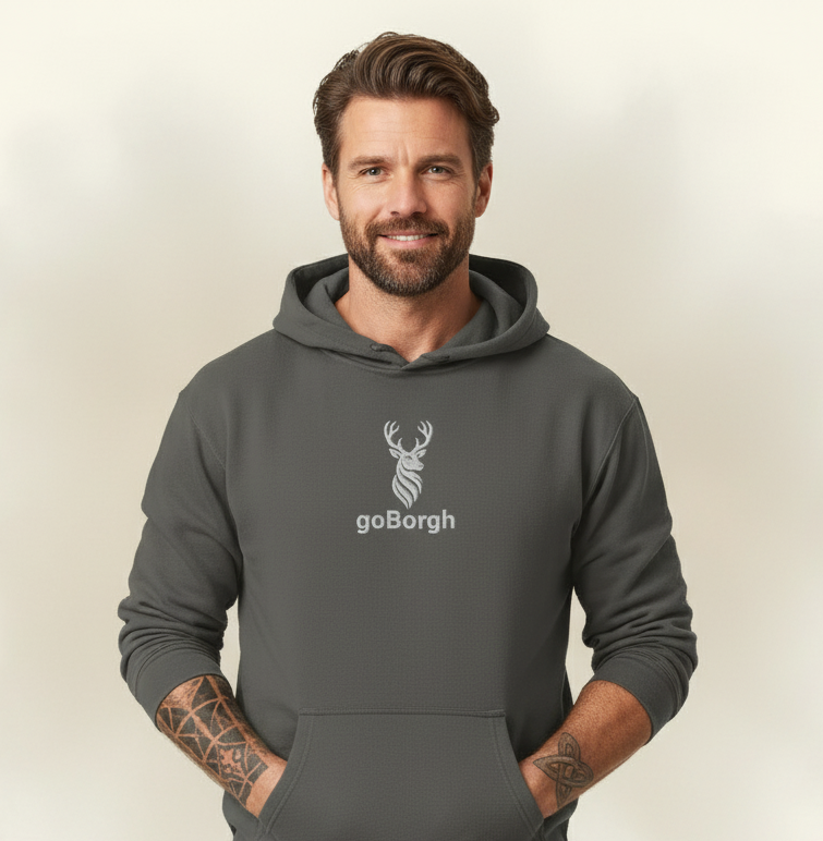 Model wearing the goBorgh® Highland Frontier™ Front & Center Stag premium hoodie in charcoal gray, front view with embroidered stag detail