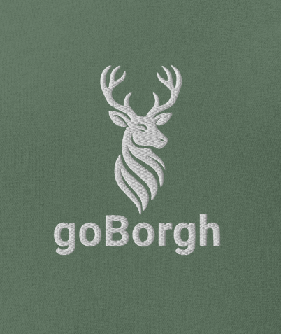 Close-up of embroidered Highland Frontier™ Summit Stag and goBorgh® wordmark on Pigment Alpine Green joggers