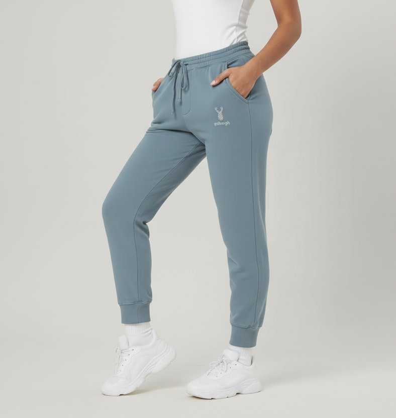 Model wearing Pigment Slate Blue Highland Frontier™ Summit Stag goBorgh® joggers with tapered ankle cuffs