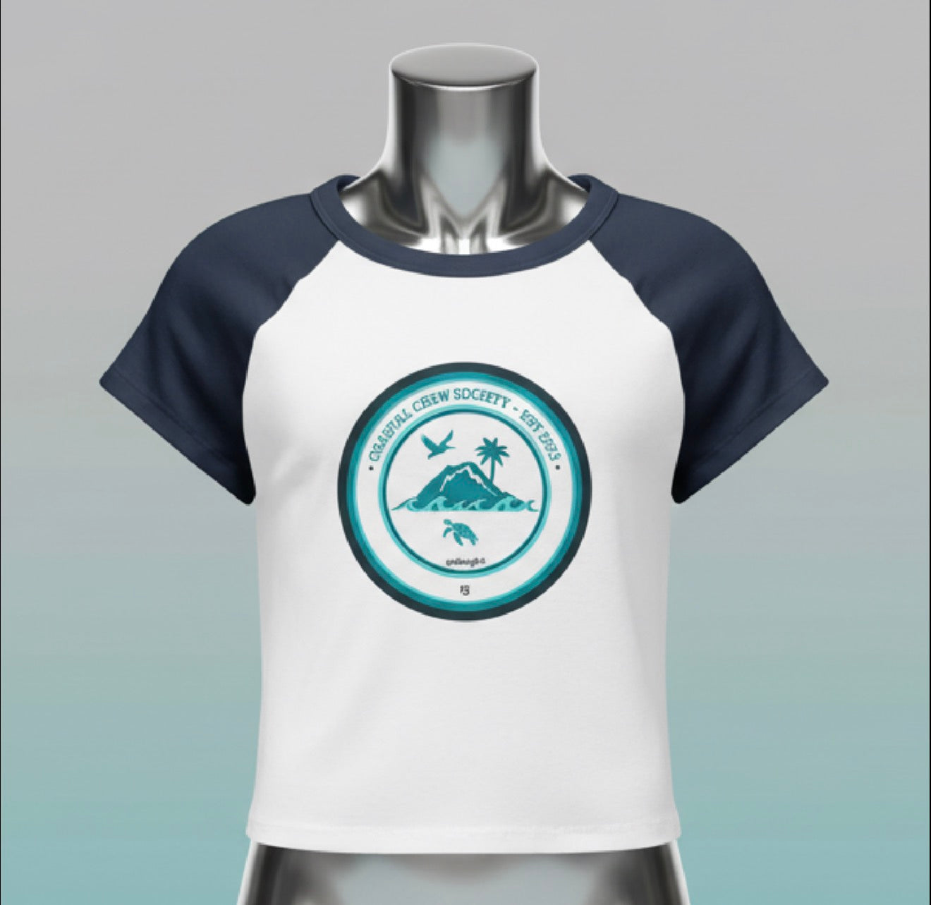 Front view of the goBorgh® Island Society Seal cropped baby tee in navy and white, showcasing the circular wave, mountain, and palm emblem with a clean studio presentation.