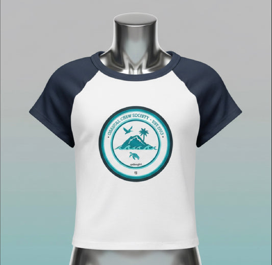 Front view of the goBorgh® Island Society Seal cropped baby tee in navy and white, showcasing the circular wave, mountain, and palm emblem with a clean studio presentation.