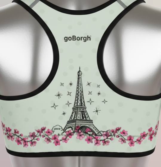 Close-up of the back artwork on the goBorgh® Paris Eiffel Tower Cherry Blossom sports bra featuring Eiffel Tower and cherry blossoms.