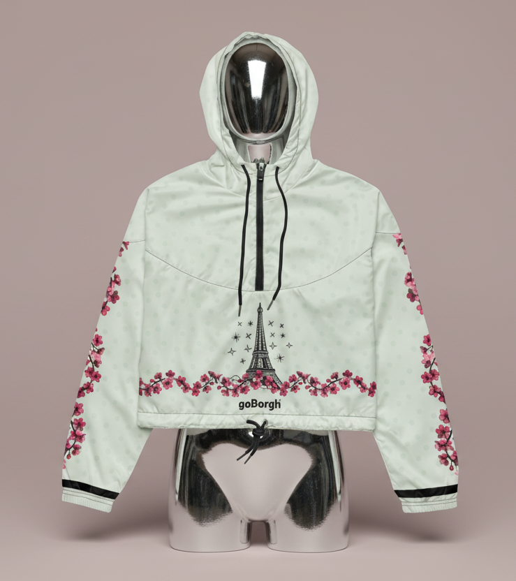 Full front product view of goBorgh Paris in Bloom cherry blossom half zip windbreaker with Eiffel Tower illustration and cherry blossom trim.
