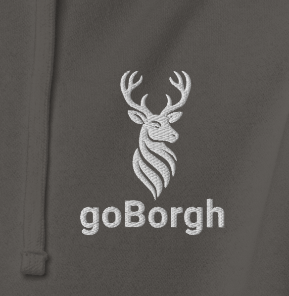 Close-up of embroidered Highland Frontier™ stag and goBorgh® wordmark on Pigment Black hoodie
