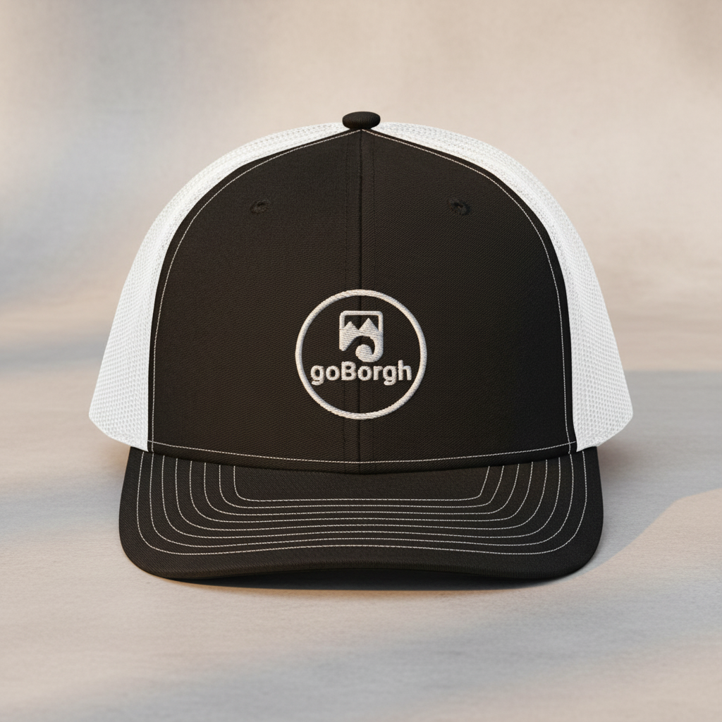 Front view of a goBorgh® Coastal Crew snapback trucker cap showing embroidered logo
