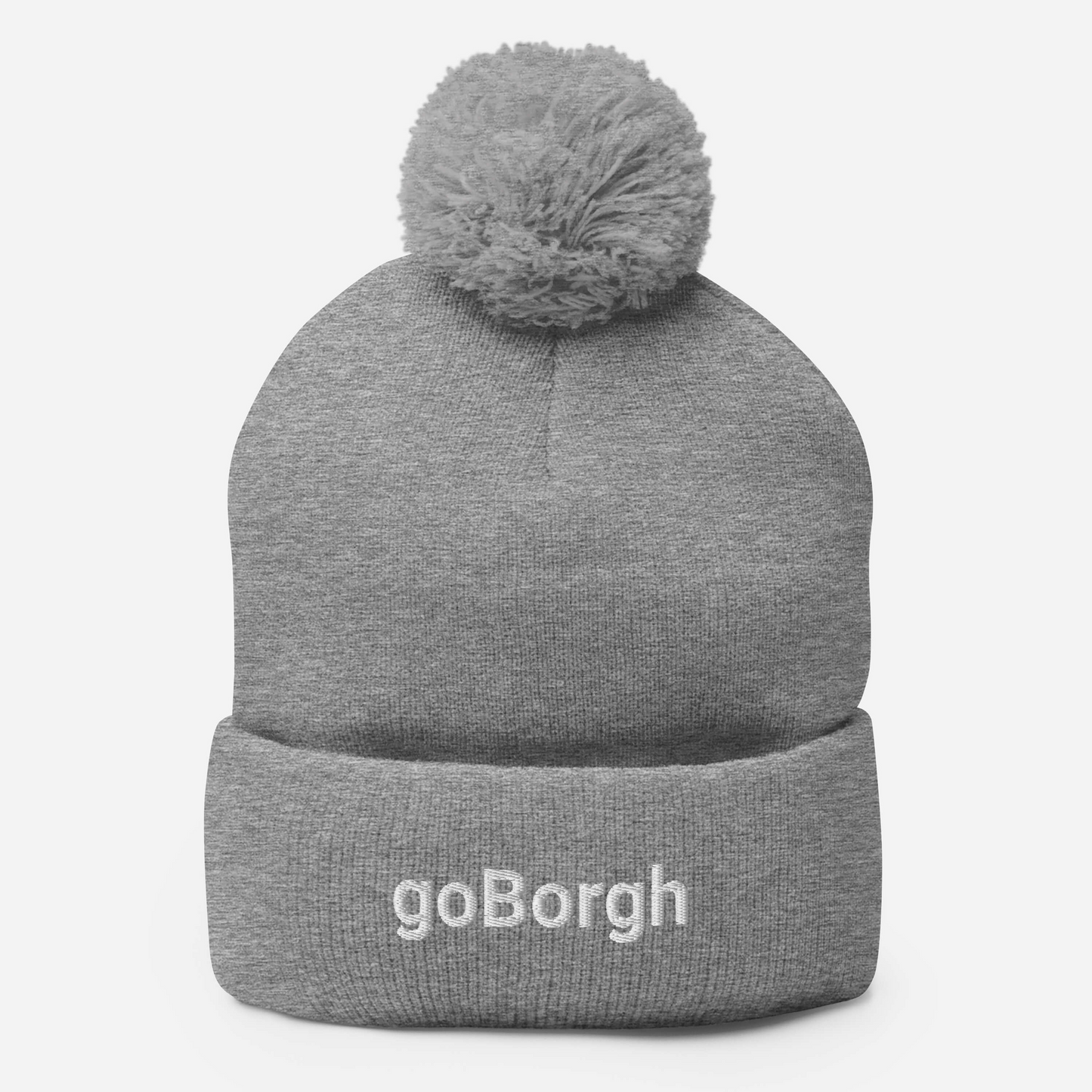 Gray goBorgh knit beanie with pom displayed flat with folded cuff