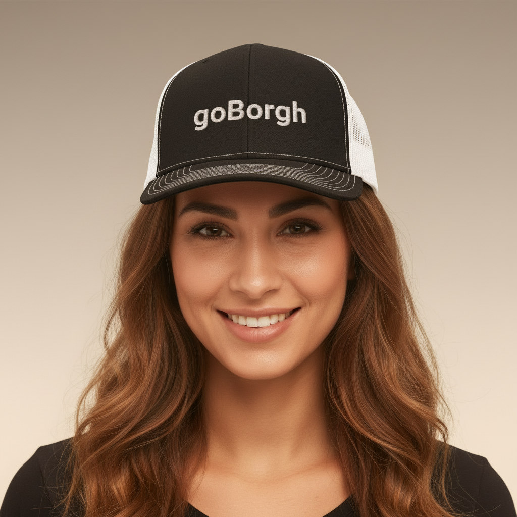 woman wearing goBorgh snapback trucker hat front facing portrait